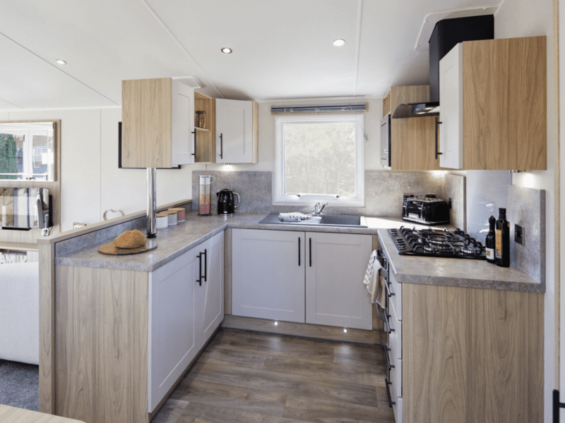 Inside view of the kitchen in a static caravan house at Mowbreck Park